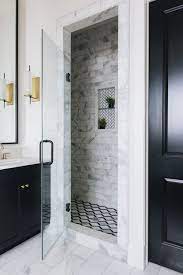 Modern farmhouse style is a style that combine modern color schemes, shapes, and materials with the rustic warmth of untreated wood turn your clean white and grey bathroom into modern farmhouse bathroom by adding natural wood farmhouse bench just like min day architects did. Sophisticated Chic Modern Farmhouse Home Tour Pickled Barrel In 2020 White Interior Doors White Interior Design White Bathroom Interior