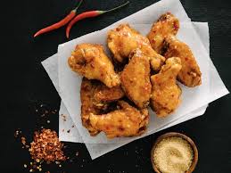 Using tongs, remove wings from batter one at a time, allowing any excess batter to drip back into bowl, and add to hot oil. Korean Chain Bonchon Expands To Dallas With More Spicy Fried Chicken Culturemap Dallas