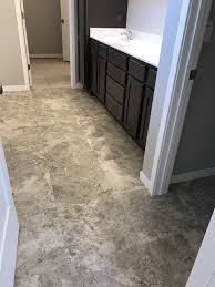 Luxury Vinyl Tile In A Marble Stone Look Installed Without Grout Bathroom Flooring Luxury Vinyl Tile Laundry Room Bathroom