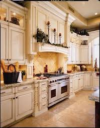 Kitchen Cabinets Rope Detail On Uppers Lighting In Niches Mantle On Range Hood Rope Corbels Kitchen Cabinet Remodel Custom Kitchen Cabinets Kitchen Design