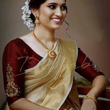 The custom of women wearing a dress' dates back a long time and many people still choose to wear them. Setmundu Collection Kerala Sarees And Mundu Surbhi Sarees