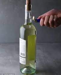 To start off, remove the bottle's cover to expose the cork in question. 7 Genius Kitchen Hacks That Will Turn You Into A Pro Chef Wine Corkscrew Wine Opener Hack Open Wine Without Opener
