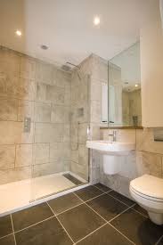 Bathroom tile designs can make a big impact. 20 Brown Tile Bathroom Magzhouse