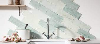 A brick wall with a navy hex tile backsplash and white grout is a bold idea for a contemporary kitchen. 10 Kitchen Wall Tile Styles Modern Kitchen Wall Tiles Ideas