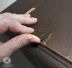 I began by putting clumps of the filler onto the wood and used my fingers to pull it towards the edge of the veneer. How To Fix Peeling Or Chipped Veneer Salvaged Inspirations