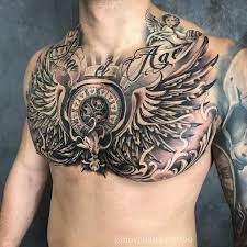 A Kepen A Kovetkezok Lehetnek Egy Vagy Tobb Ember Es Kozeli Chest Tattoo Men Tattoos Chest Piece Tattoos