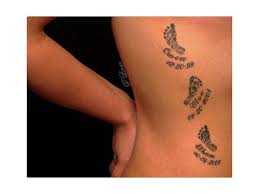 Each footprint represents each child in your family. Mom Tattoos Super Cool Ways To Get Your Kid S Name In Ink Tattoos For Daughters Tattoos For Kids Mom Tattoos