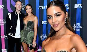 Before meeting boyfriend christian mccaffrey, olivia culpo had some reservations about dipping her toe back into the athlete dating pond. Olivia Culpo Smolders With Nfl Beau Christian Mccaffrey At Super Saturday Night Bash In Miami Daily Mail Online