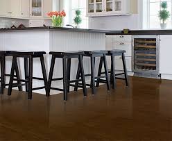 Serious cooks will want to wear comfortable shoes or put down floor mats or area rugs, because standing on tile for long periods of time can be tough on legs and backs. Kitchen Flooring With Natural Cork Flooring Material Floating Or Tiles