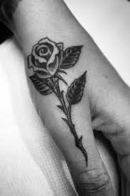 Tattoodo Rose Hand Tattoo Hand Tattoos Hand Tattoos For Guys