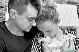 Distressed' toddler sat in back of car while man knocked dad's tooth out