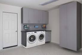 My question is how high should cabinets be off the ground when they are above the washer/dryer? Silver Slate Cabinets With Washer Dryer Angle Malouf 2016 South Bay Custom Closets