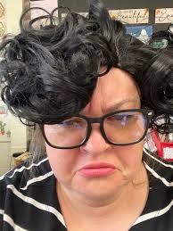 Mrs. Schultz and her students read Miss Nelson Is Missing last Friday. On  Monday, Mrs. Schultz came to school dressed as Miss Viola Swamp. The  students compared and contrasted the characters and