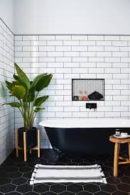 Simple Minimalist Bathroom Made Interesting With Multi Tiling And Pops Of Green And Brown Home Decor Bathroom Decor Bathroom Interior