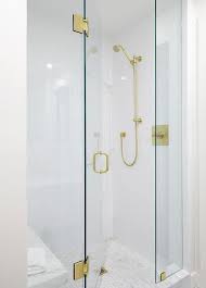 We regretted not giving it another coat but we didn't have the time. Seamless Glass Shower With Brass Hinges A Brass Shower Door Handle And Brass Shower Kit Bathroom Shower Doors Shower Door Handles Glass Shower Doors