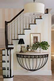 This console table, for example, is perfectly at home in a traditional aesthetic and is crafted from solid acacia wood, in a simple but classic design, featuring a bottom shelf. 50 Best Entry Table Ideas Decorations And Designs For 2021