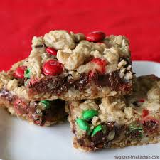 Brownies with nuts, chocolate chip cookies with walnuts, reese's peanut butter cups, m&ms with peanuts, and chestnuts roasting on an all you want for christmas this year is a nut free christmas. Gluten Free Peanut Butter Christmas Dream Bars