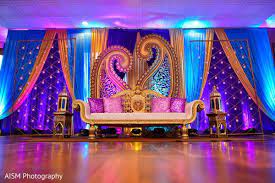 I Like The Draping Candle Walls And Giant Mangos Indian Wedding Decorations Receptions Indian Wedding Stage Wedding Reception Decorations