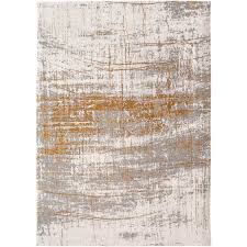 Perfect for lending your home a decorative touch, area rugs are like this one are also handy for protecting hardwood and tile floors while muffling the sound. Louis De Poortere Mad Men Griff Rug 8419 Columbus Gold