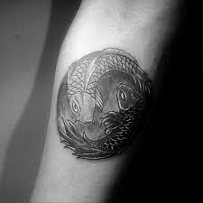 The small circles show that nothing is unequivocal. 40 Yin Yang Koi Fish Tattoos For Men Cosmic Force Ink Ideas