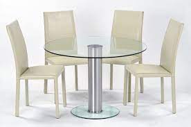 There is a chance of you buying a glass table that will look like and eyesore, so choose well. Adorable Small Dining Tables And Chairs For Four With Glass Table Design With Cream C Glass Round Dining Table Round Glass Dining Room Table Glass Dining Table