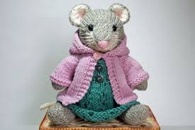 I was googling something or other yesterday and found this image on google images. Knitted Mouse Toy In Springtime Dress And Hoodie Sweater Knitted Dolls Crochet Dolls Crochet Mouse