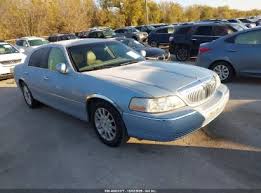 Image result for Light Ice Blue 2006 Town Car