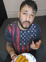 Mexican with Mustache That Curls Up in Car