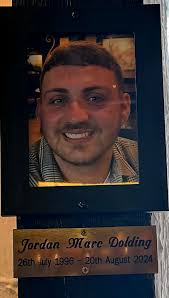 In memory of our beautiful Jordan, placed where he liked to stand with his  lovely family and friends with a pint of Coors in hand . Forever missed,  Forever remembered, Forever in