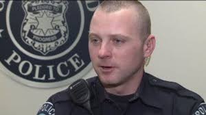 Happy to step in:' Greenfield police officer praised for helping elderly  woman shovel her driveway