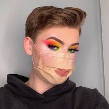 Beauty influencer applied fierce makeup over his face mask