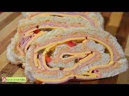 Nino Envuelto Jamon Y Queso O Rollitos De Sandwich Rosvi Hernandez Youtube Sandwichon Receta Rollitos De Jamon Y Queso Recetas De Comida