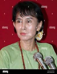 FILE**Myanmar's pro-democracy leader Aung San Suu Kyi gives a press  conference at her National League for Democracy (NLD) party headquarters in  Yangon, Myanmar, in this April 23, 2003 file photo. The 62-year-old