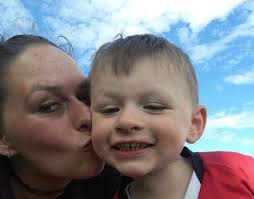 Toddlers desperately try to wake mum who collapsed and died