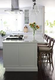 Before After A Dark Kitchen Gets A Family Friendly Makeover Kitchen Island With Stove Kitchen Island With Cooktop White Kitchen Design