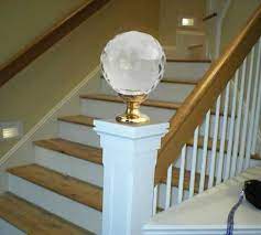 This Glass Finial Tops A White Newel Post To Start The Handrail System On This Staircase Mixed Materials Add A Stylish Stairs Timber Handrail Stairway Design