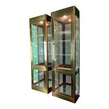 This fabulous cabinet that was designed by john widdicomb for mastercraft in the 1970s is modern. Pair Of Mastercraft Brass And Glass Vitrine Display Cabinets
