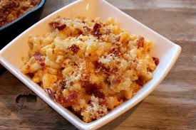 To the macaroni, add 1 1/2 cups of shredded cheeses, half and half, the cubed cheese and the eggs, and the seasoned salt and pepper. Skillet Baked Macaroni And Cheese