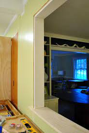 A sliding door in another option. How To Trim Out A Cased Opening And A Half Wall Young House Love