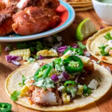 Transfer to the prepared baking sheet and bake until the fish flakes easily, about 10 minutes, depending on thickness. Easy Baked Fish Tacos A Wicked Whisk