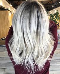 For that reason, a lighter hair color can make you look younger, especially when paired with an appropriate, modern hairstyle. White Ice Blonde With Mild Shadow Root Pale Blonde Hair Silver Blonde Hair Blonde Hair With Roots
