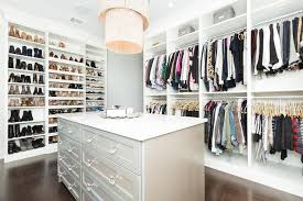 Large and colorful master closet design. Wall Of Custom Shoe Shelves Transitional Closet
