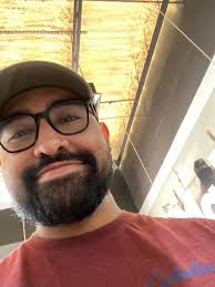 BCBL'S Erick Gracia holds out the giant barb of a Southern Stingray he  caught a few nights before. Not only is the stinger of a Southern Stingray  extremely sharp, they're also covered
