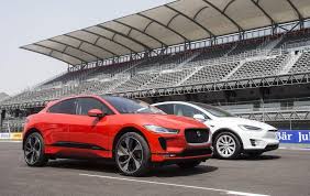 Watch Jaguar S I Pace Beat Tesla S Model X Head To Head Stock 2016 Tesla Model X P100d Ludicrous 1 4 Mile Drag Lamborghin In 2020 Tesla Model Tesla Model X Tesla S