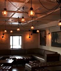 The bronze finish adds extra elegance with a slightly vintage touch that will look on trend. Industrial Style Cluster 5 Light Cage Pendant Available In Three Finishes