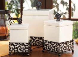 The sleek canister stores needed vanity staples and prov. Set Of 3 Attractive Ceramic Canisters In A Metal Base 59 55 Square Canister Set Ceramic Canisters Canister Sets