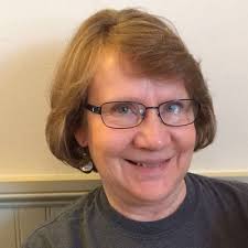 Retired Teacher Now Teaches Refugees, to Town's Benefit