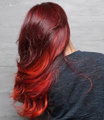 The dark red is as dark as the others on here and the lighter colour is introduced sooner down the hair. 25 Thrilling Ideas For Red Ombre Hair