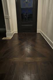 Modern wooden flooring for a warm and beautiful home is the best option for flooring any home living room bedroom floor or even kitchen flooring. Hard Wood Foyer With A Inlaid Pattern Www Facebook Com Perque Floors Darkhardwood Realwoodfl Ceramic Wood Tile Floor Wood Floor Design Tile Floor Living Room