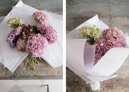 In this tutorial, you've learned how to make four different flowers using two types of paper. How To Wrap A Floral Bouquet Hooray Mag